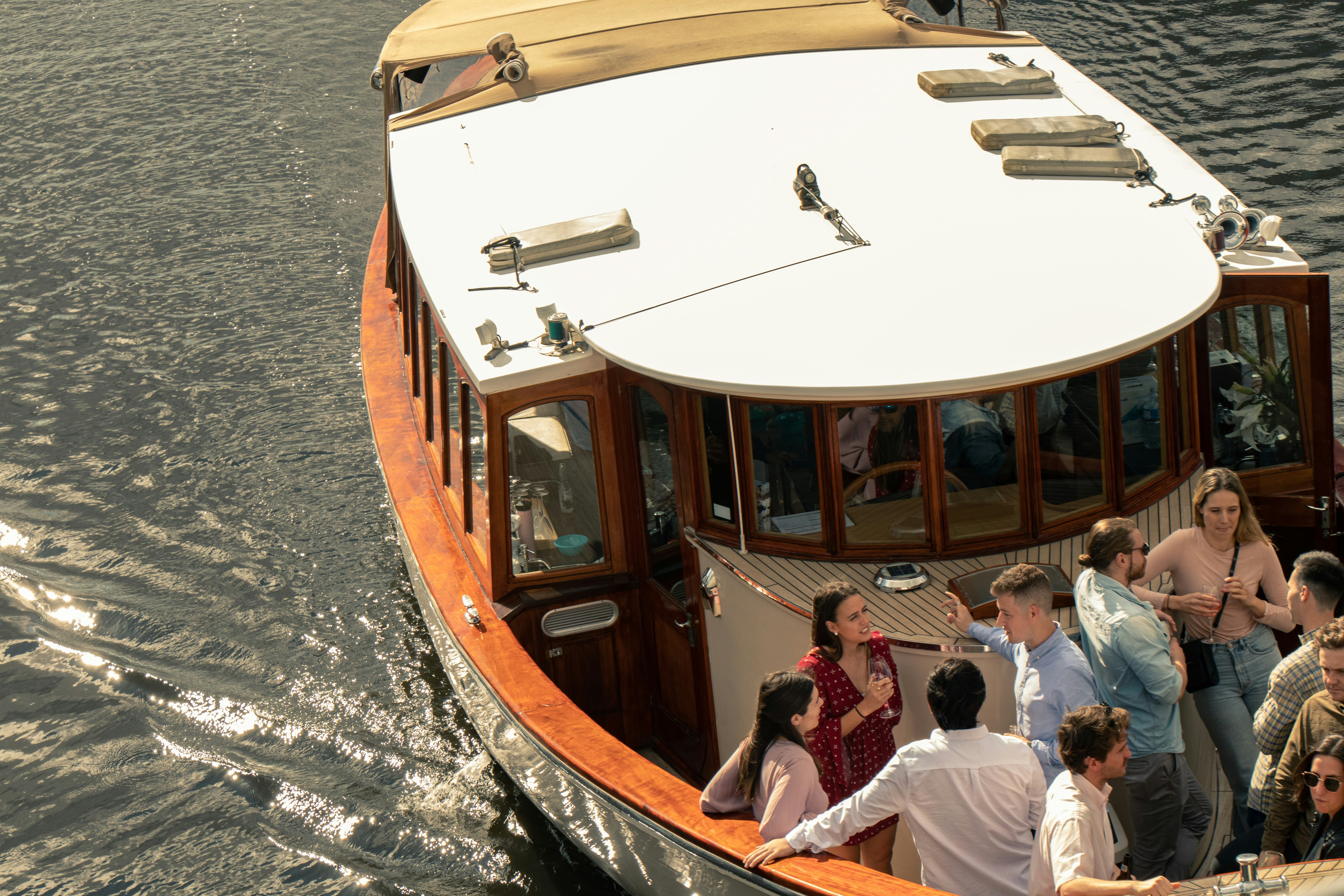 white and brown sailboat